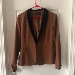Tan blazer with black lapel